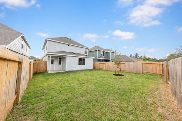 a house view with a garden space