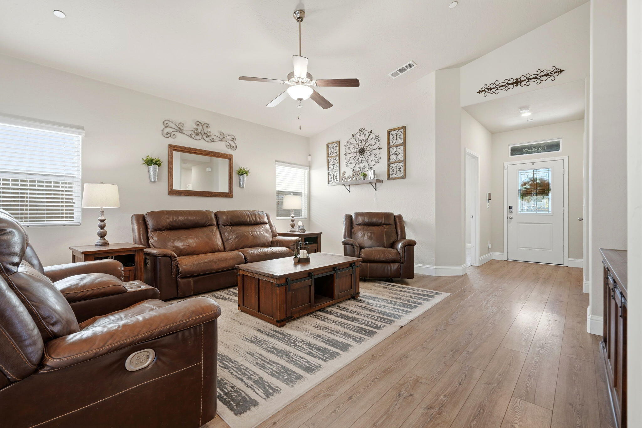 756 Strada Street Lemoore, CA 93245 - Photo 9 of 53 a living room with furniture and a wooden floor