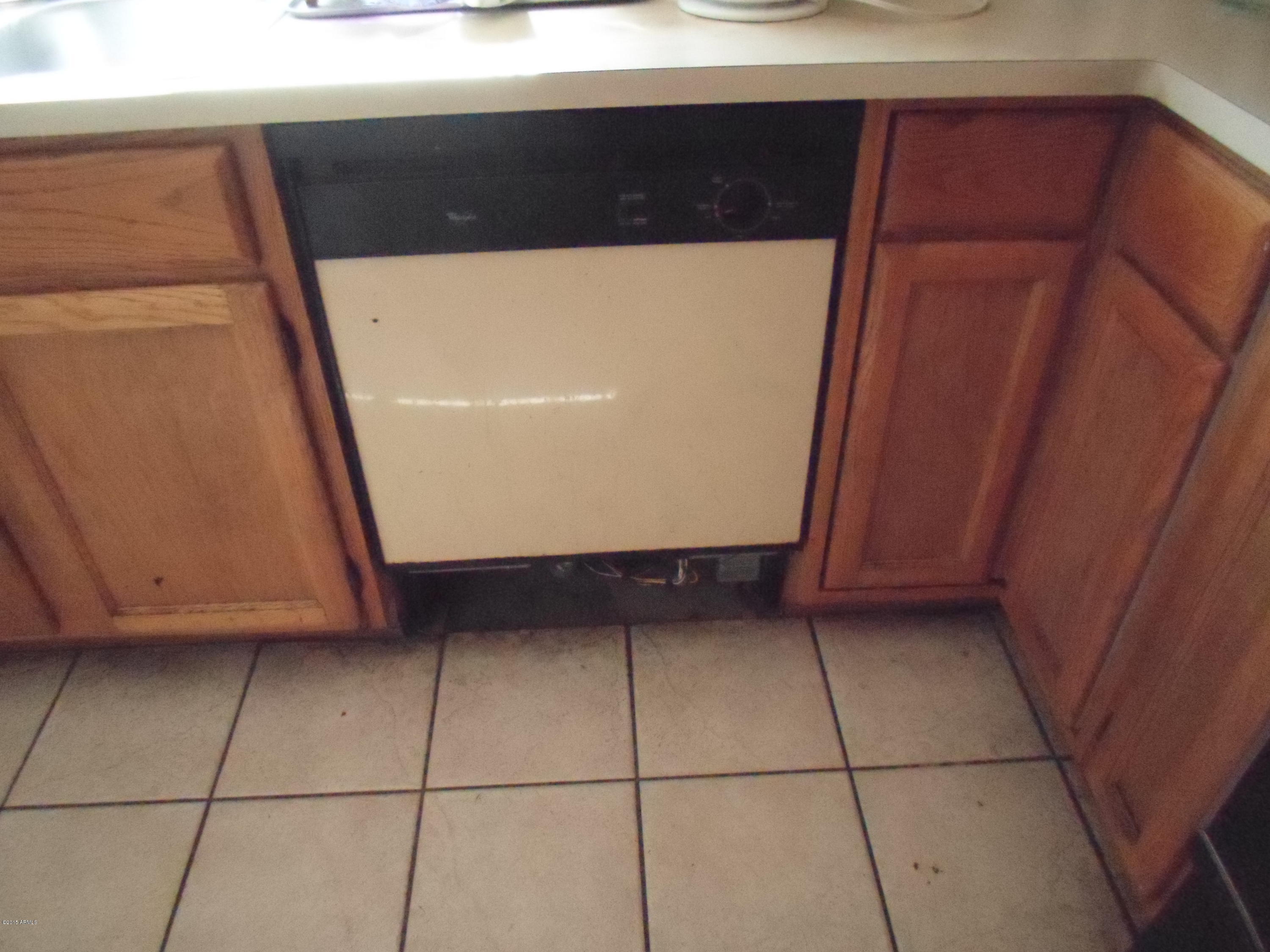 6239 Casper Road Mesa, AZ 85205 - Photo 3 of 7 a view of washer and dryer