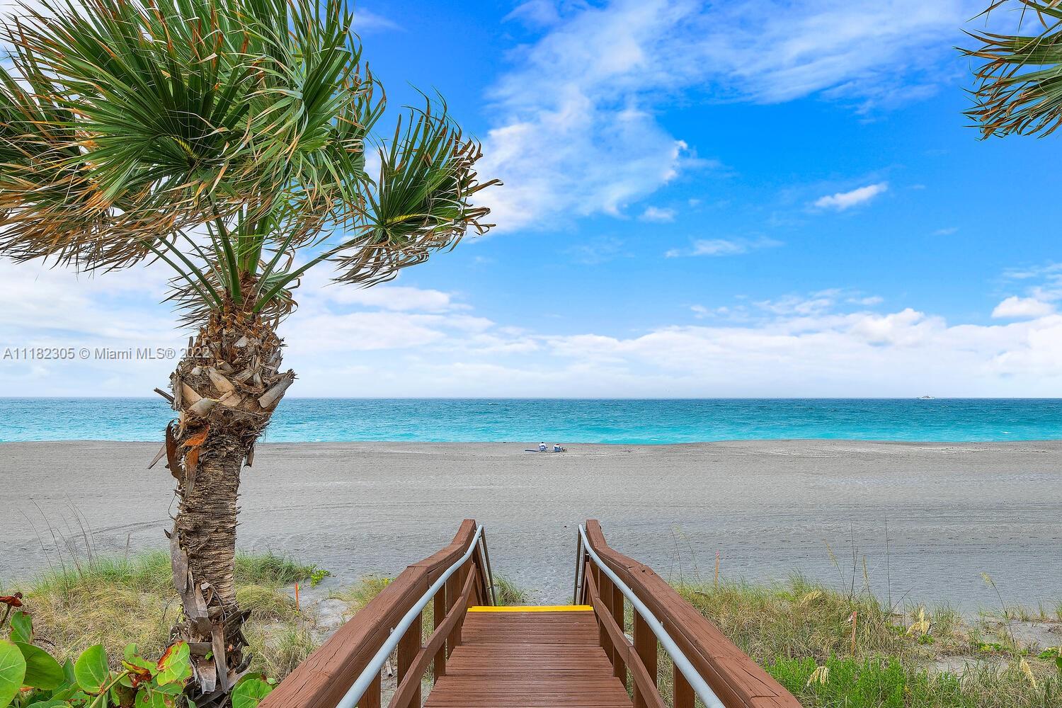 300 Ocean Trail Way, Unit 104 Jupiter, FL 33477 - Photo 1 of 26 a view of beach and ocean