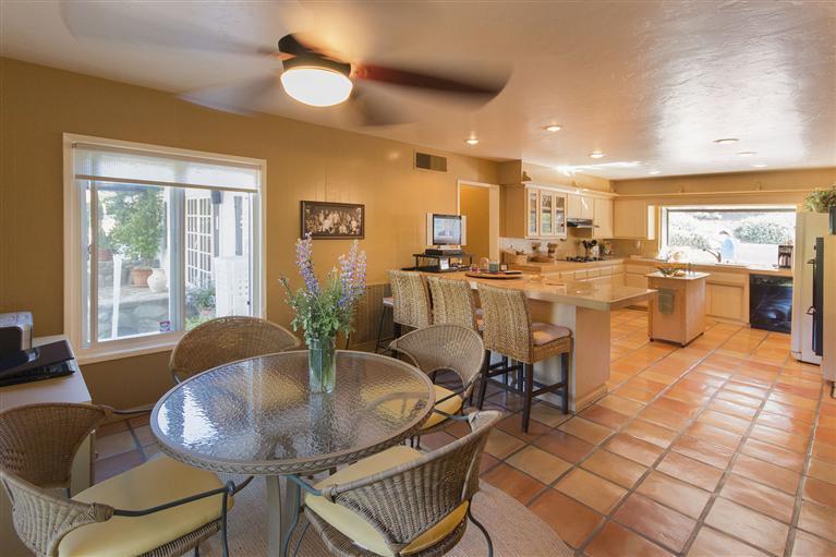1195 Rancho Court Ojai, CA 93023 - Photo 16 of 49 a view of a dining room with furniture wooden floor and chandelier