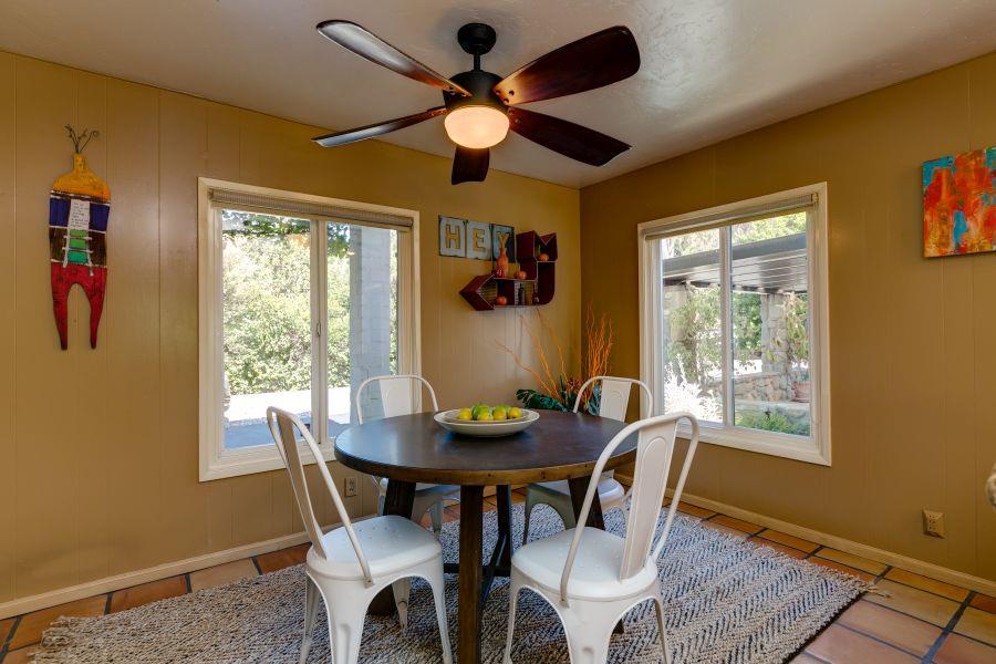 1195 Rancho Court Ojai, CA 93023 - Photo 17 of 49 a dining room with furniture a rug and a large window