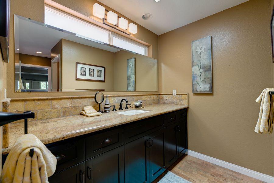 1195 Rancho Court Ojai, CA 93023 - Photo 22 of 49 a bathroom with a sink and a mirror