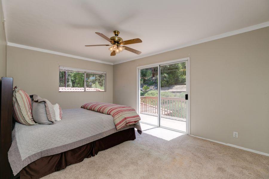 1195 Rancho Court Ojai, CA 93023 - Photo 28 of 49 a bedroom with a large bed and a window