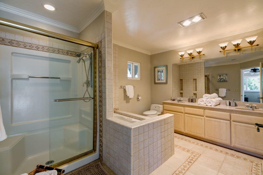 1195 Rancho Court Ojai, CA 93023 - Photo 32 of 49 a bathroom with a tub a sink shower and mirror