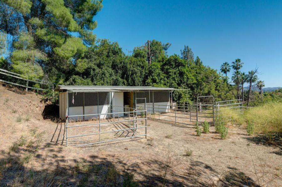 1195 Rancho Court Ojai, CA 93023 - Photo 45 of 49 a backyard of a house with table and chairs with wooden fence