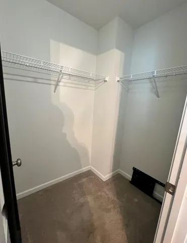 a view of a room with racks on the wall