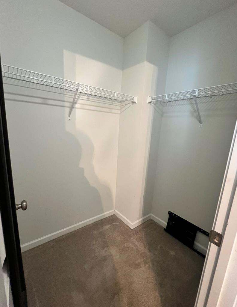 1048 Crosswinds Drive Midland, GA 31820 - Photo 23 of 25 a view of a room with racks on the wall