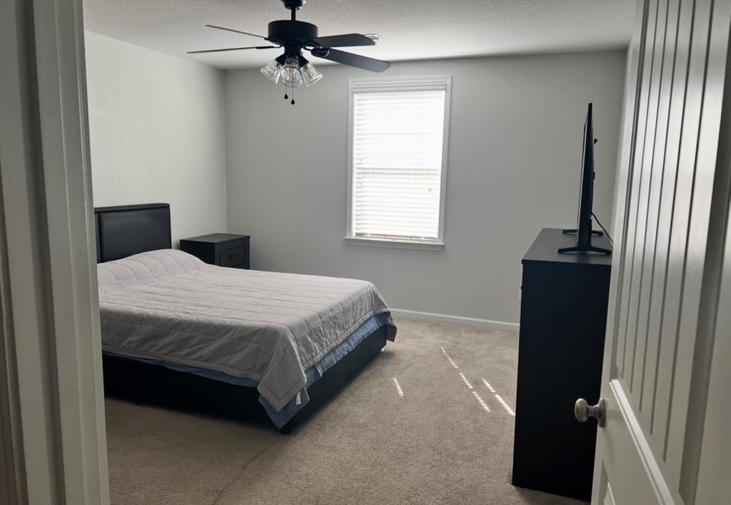 1048 Crosswinds Drive Midland, GA 31820 - Photo 25 of 25 a bedroom with a bed and a window