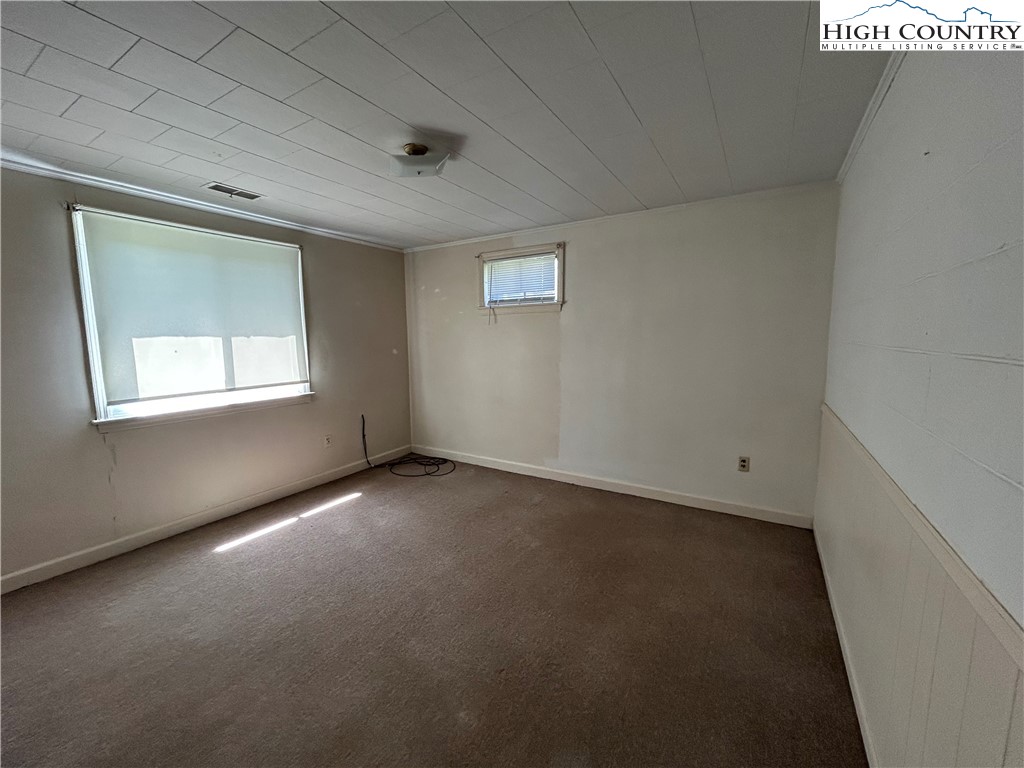 116 Cole Street Boone, NC 28607 - Photo 17 of 21 an empty room with a window