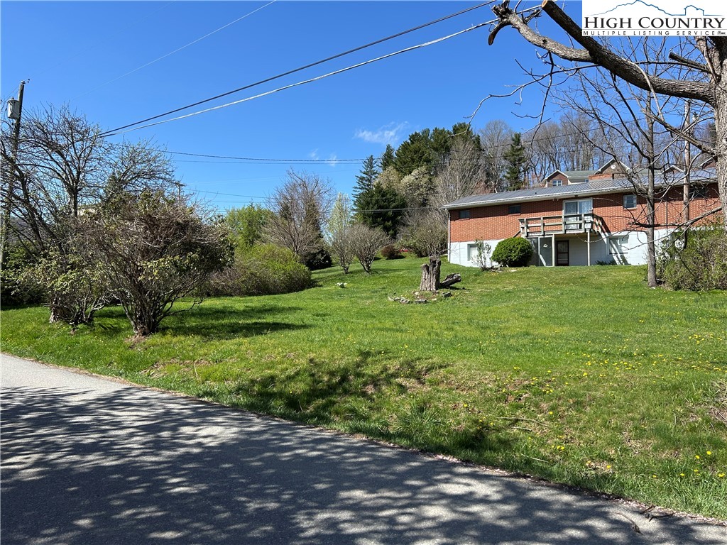 116 Cole Street Boone, NC 28607 - Photo 20 of 21 a view of a house with a yard