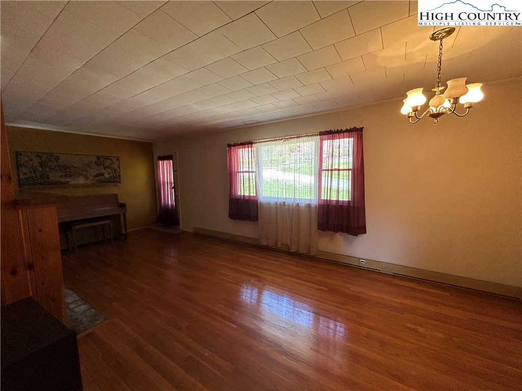 116 Cole Street Boone, NC 28607 - Photo 4 of 21 a view of livingroom with hardwood floor and window