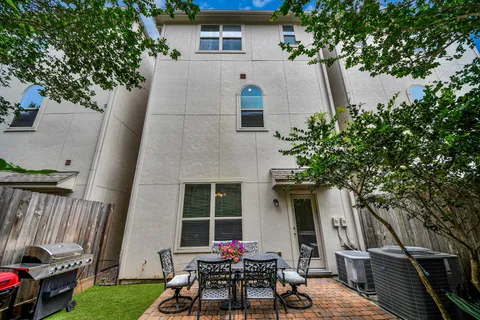 front view of a house with a garden