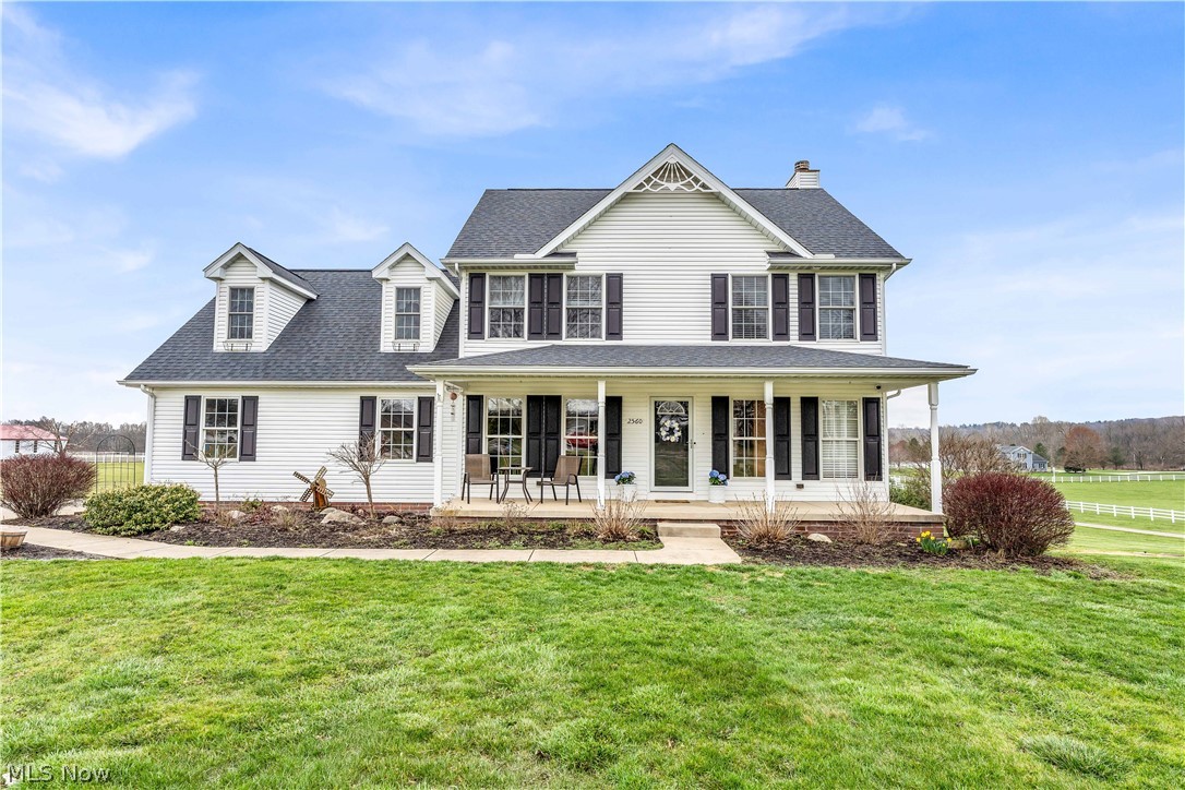 2560 Blake Road Wadsworth, OH 44281 - Photo 1 of 30 View of front of house featuring a front lawn and covered porch
