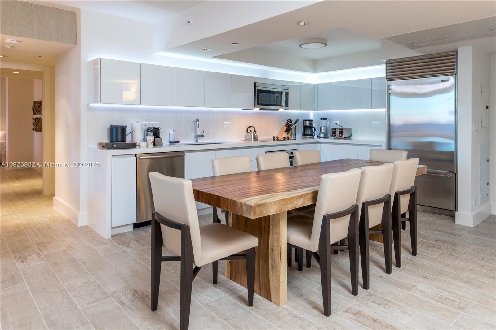 102 24th Street, Unit 1544 Miami Beach, FL 33139 - Photo 17 of 20 a view of a dining room with furniture