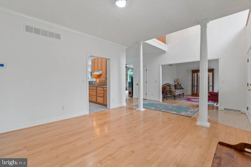 1633 Freeland Road Freeland, MD 21053 - Photo 13 of 73 a view of a livingroom with wooden floor and a large window