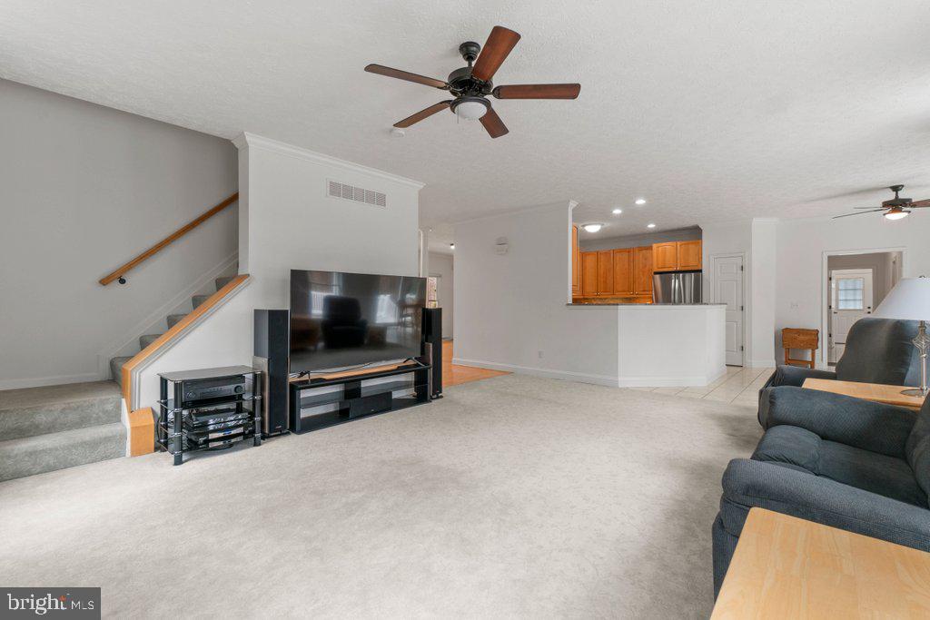 1633 Freeland Road Freeland, MD 21053 - Photo 16 of 73 a living room with furniture and a flat screen tv