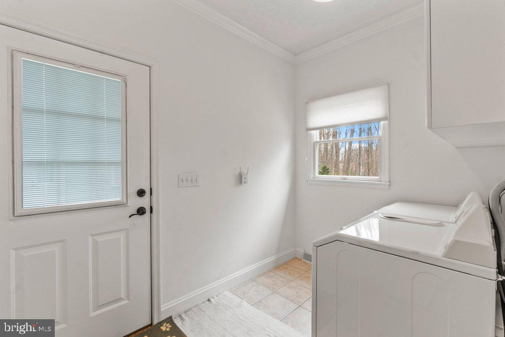 1633 Freeland Road Freeland, MD 21053 - Photo 27 of 73 a utility room with dryer and washer