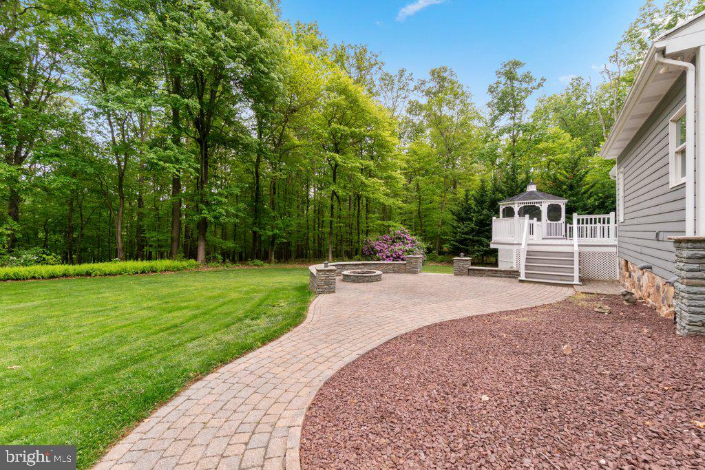 1633 Freeland Road Freeland, MD 21053 - Photo 57 of 73 a view of a backyard with a garden and entertaining space