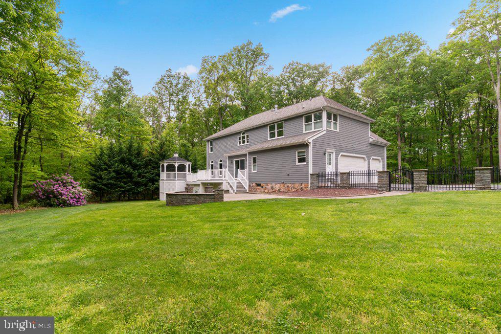 1633 Freeland Road Freeland, MD 21053 - Photo 63 of 73 a front view of a house with a garden