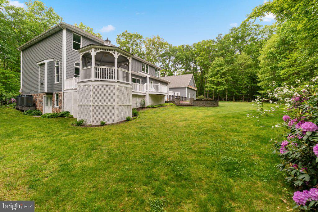 1633 Freeland Road Freeland, MD 21053 - Photo 65 of 73 a front view of a house with a garden