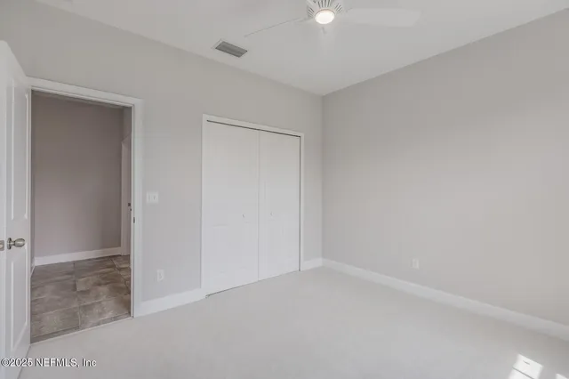 a view of a park with palm trees