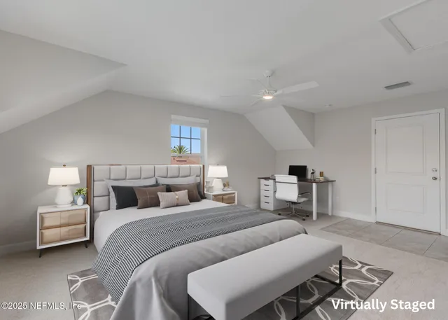 an aerial view of houses with outdoor space