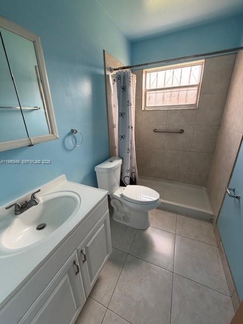 3112 Southwest 17th Street, Unit 3112 Miami, FL 33145 - Photo 11 of 12 a bathroom with a sink and a toilet