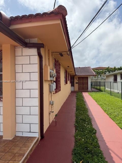 3112 Southwest 17th Street, Unit 3112 Miami, FL 33145 - Photo 2 of 12 a view of a house with a yard