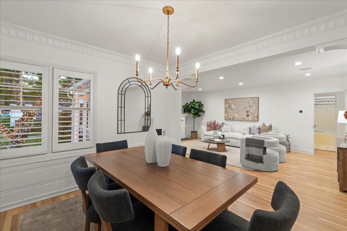 1042 Camino Ramon San Jose, CA 95125 - Photo 13 of 54 a living room with furniture a chandelier and a dining table