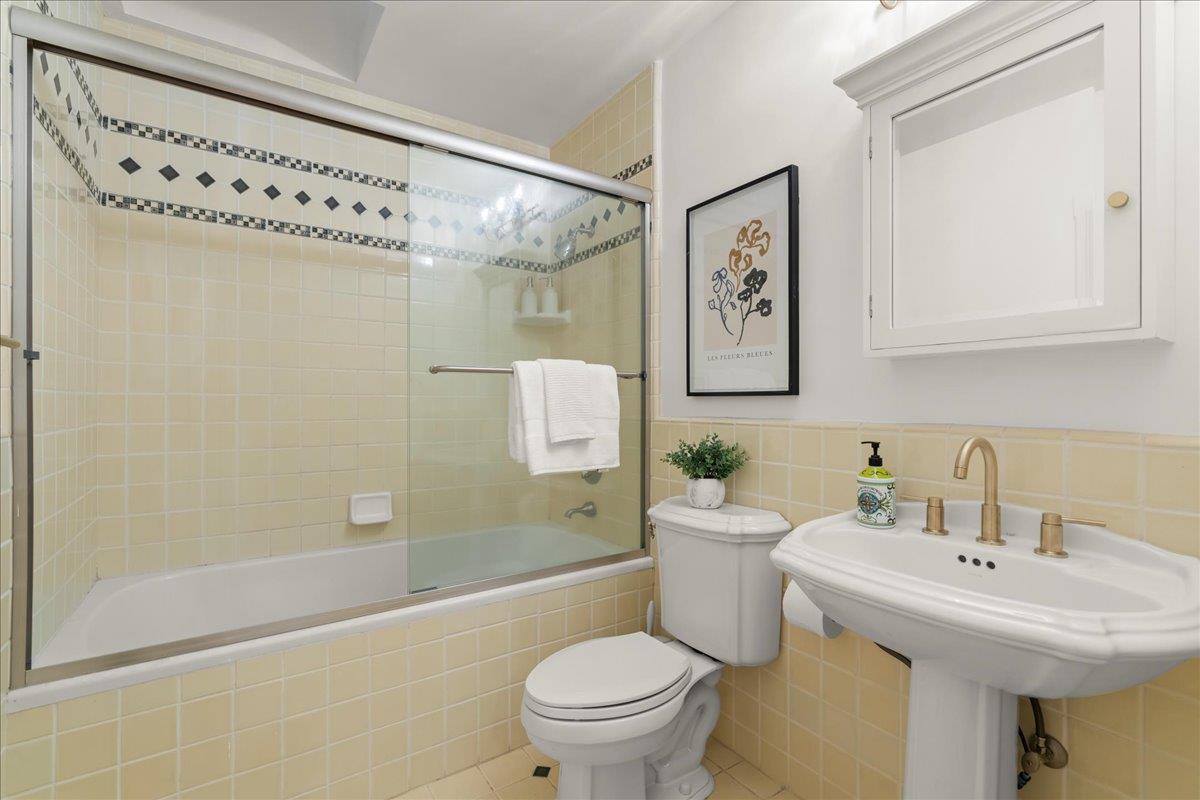 1042 Camino Ramon San Jose, CA 95125 - Photo 21 of 54 a bathroom with a sink a toilet and shower