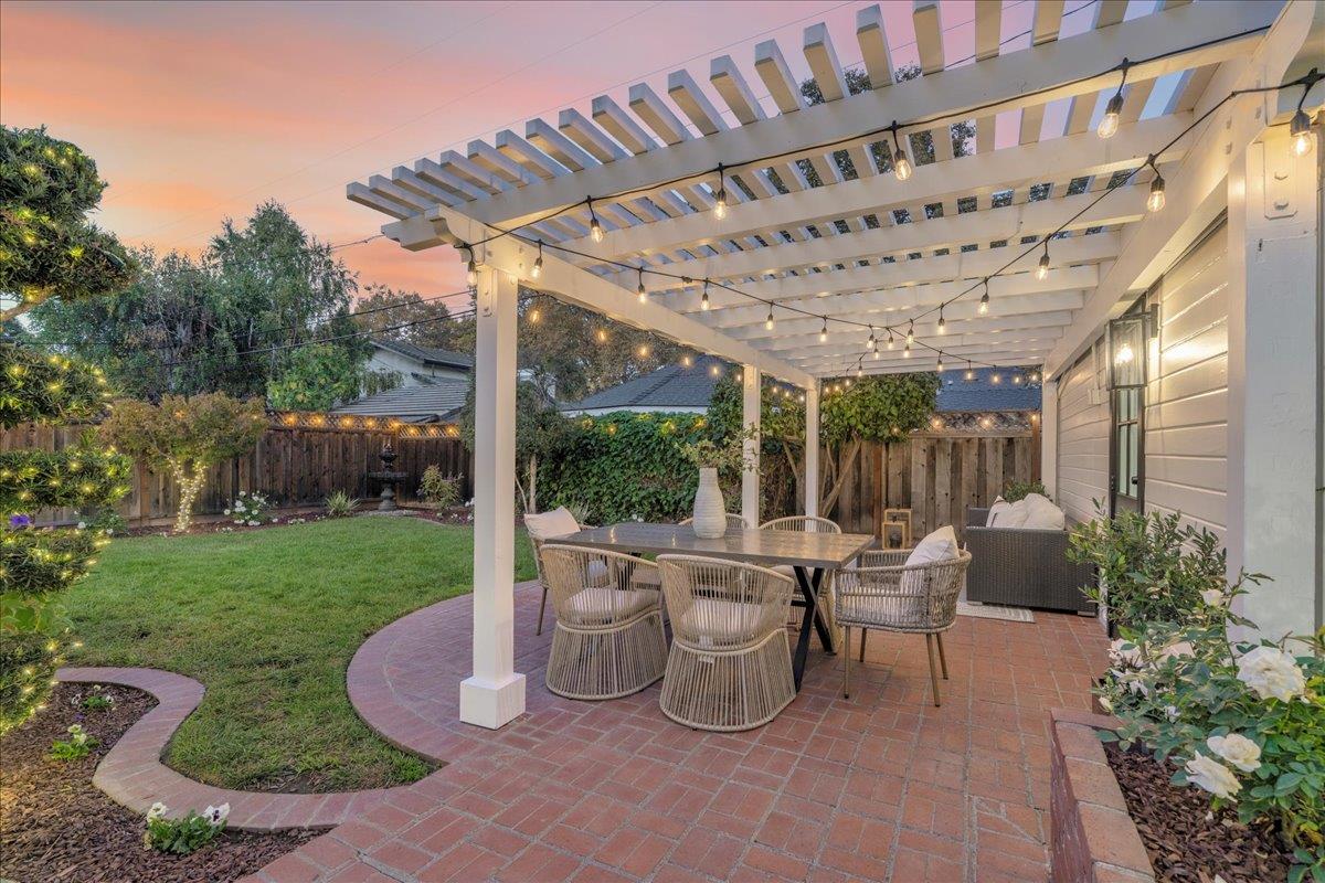 1042 Camino Ramon San Jose, CA 95125 - Photo 28 of 54 a view of a patio with table and chairs potted plants with large tree