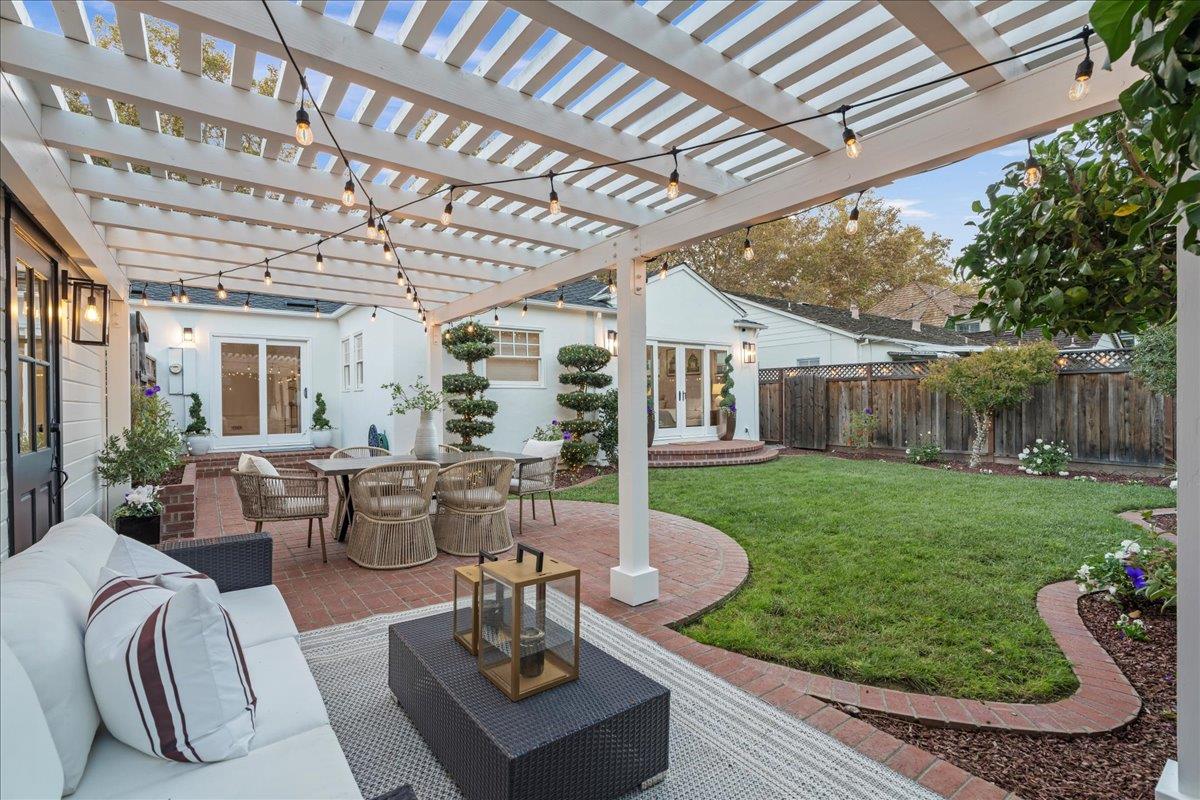 1042 Camino Ramon San Jose, CA 95125 - Photo 29 of 54 a view of a patio with couches table and chairs and wooden fence