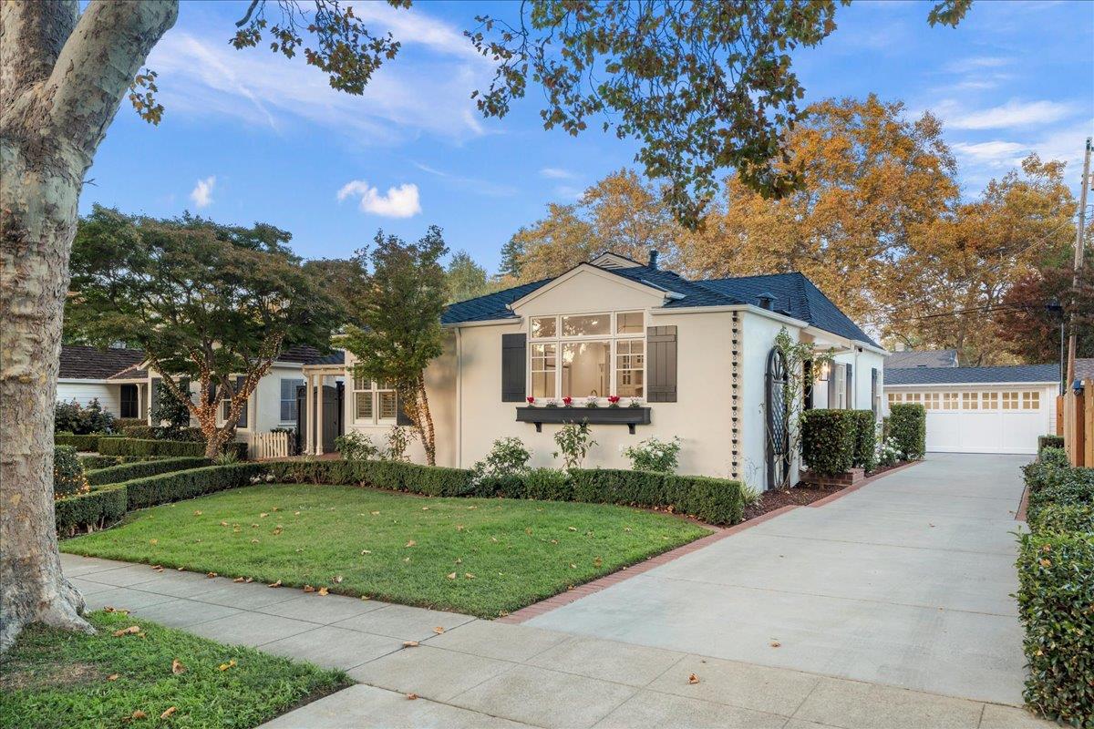 1042 Camino Ramon San Jose, CA 95125 - Photo 4 of 54 a front view of a house with a yard and trees