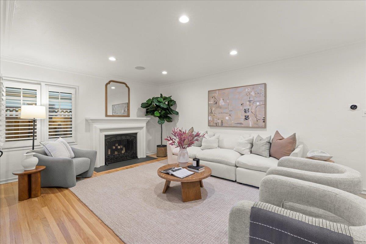 1042 Camino Ramon San Jose, CA 95125 - Photo 9 of 54 a living room with furniture and a fireplace