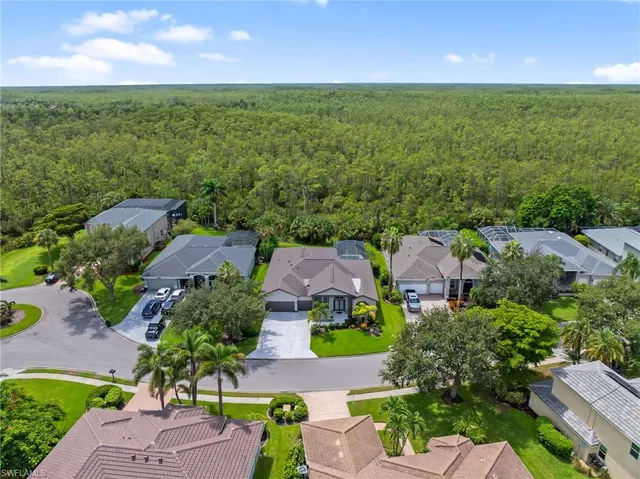 an aerial view of a house with a garden