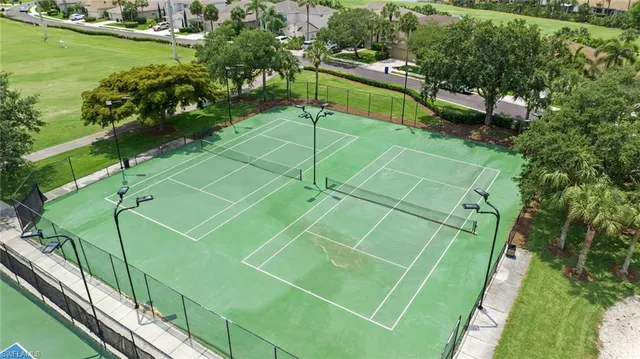 a view of green field with sitting area