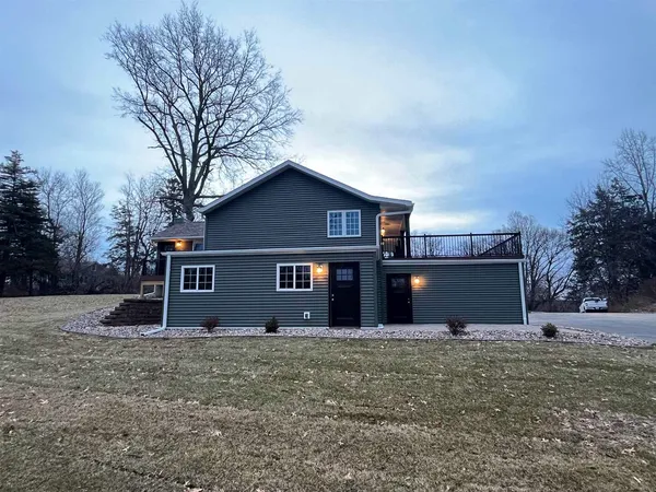 a front view of house with yard