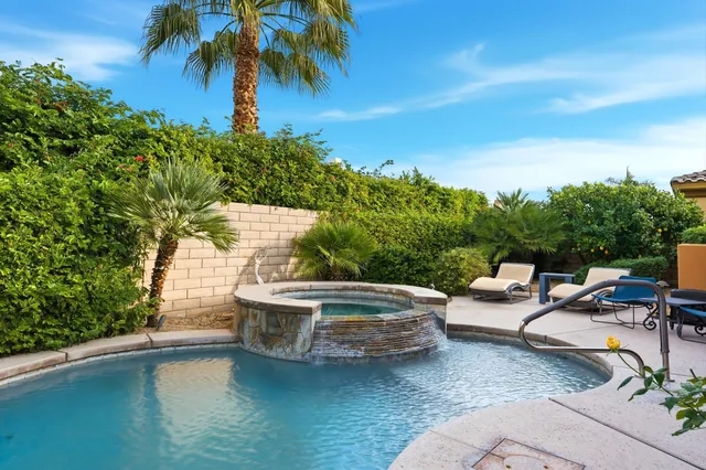 a view of swimming pool with patio