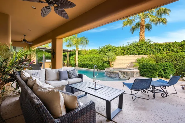 a outdoor living space with furniture and garden view