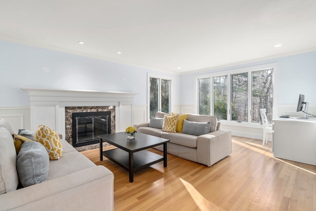 102 Byron Road Weston, MA 02493 - Photo 15 of 39 a living room with furniture and a fireplace