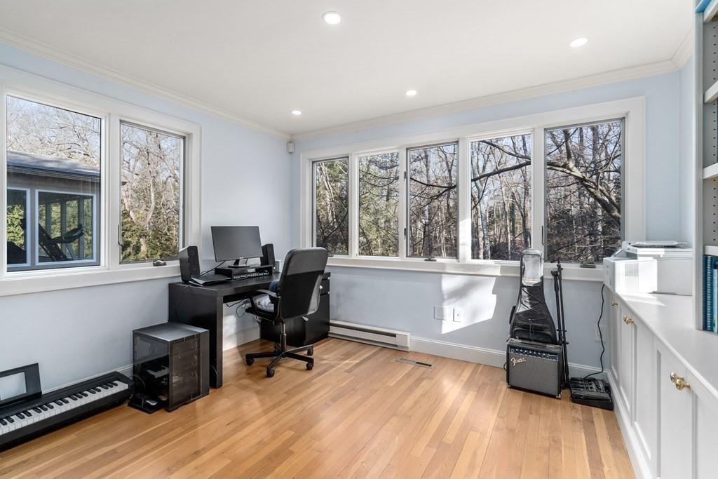 102 Byron Road Weston, MA 02493 - Photo 18 of 39 a view of a workspace with furniture and a window
