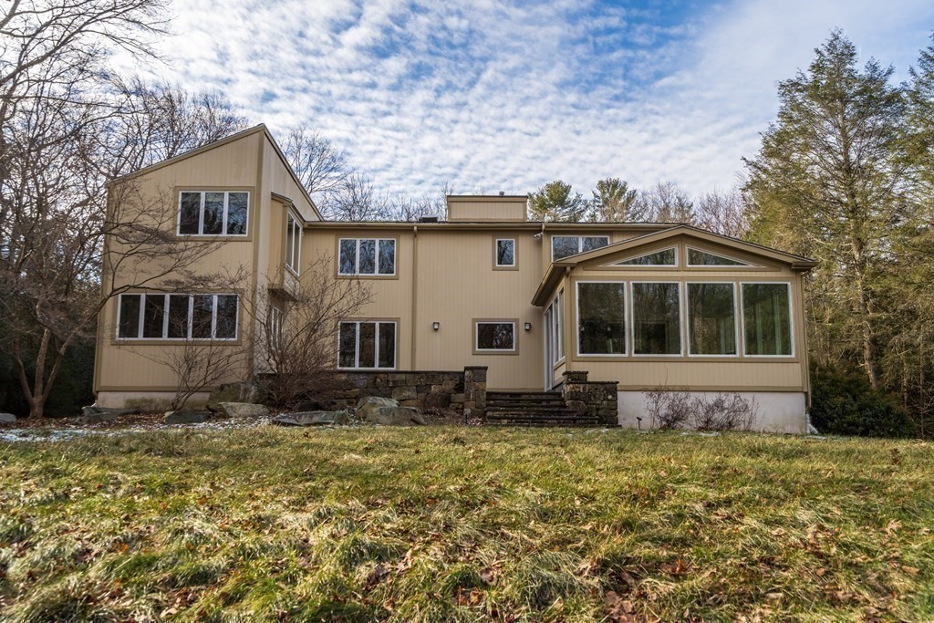 102 Byron Road Weston, MA 02493 - Photo 38 of 39 a view of front of house with a yard