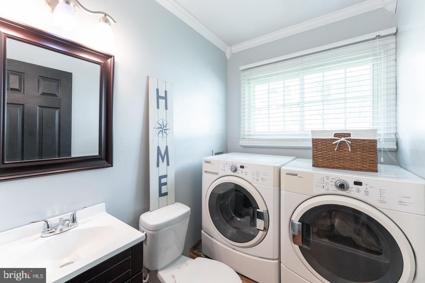 24 Halfturn Road Levittown, PA 19056 - Photo 14 of 41 Laundry and half bath on main level