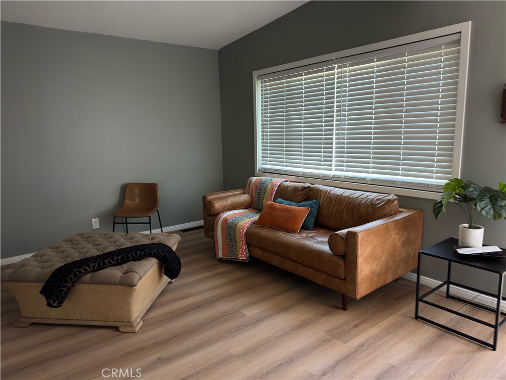1735 Chestnut Avenue Long Beach, CA 90813 - Photo 1 of 13 a living room with furniture and a window
