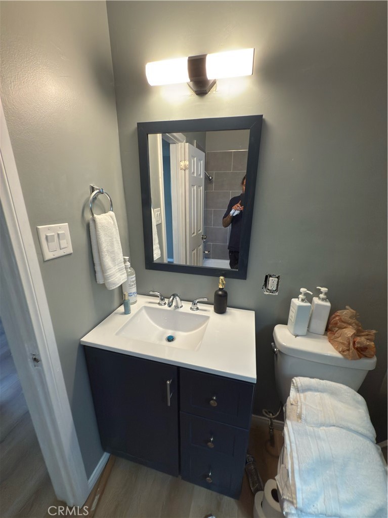 1735 Chestnut Avenue Long Beach, CA 90813 - Photo 5 of 13 a bathroom with a double vanity sink and a mirror