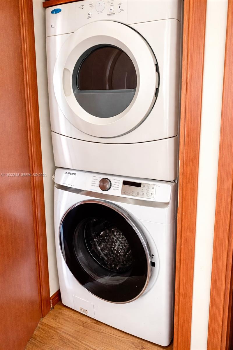 9499 Collins Avenue, Unit 903 Surfside, FL 33154 - Photo 8 of 14 a close up view of washer and dryer