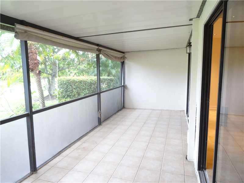 10253 Riverbend Terrace Boca Raton, FL 33498 - Photo 16 of 33 a view of empty room with wooden floor and fan