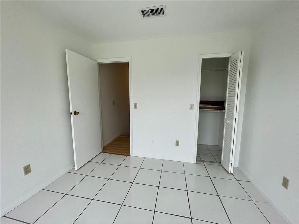 10253 Riverbend Terrace Boca Raton, FL 33498 - Photo 24 of 33 a view of an empty room