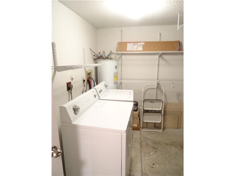 10253 Riverbend Terrace Boca Raton, FL 33498 - Photo 26 of 33 a utility room with dryer and washer